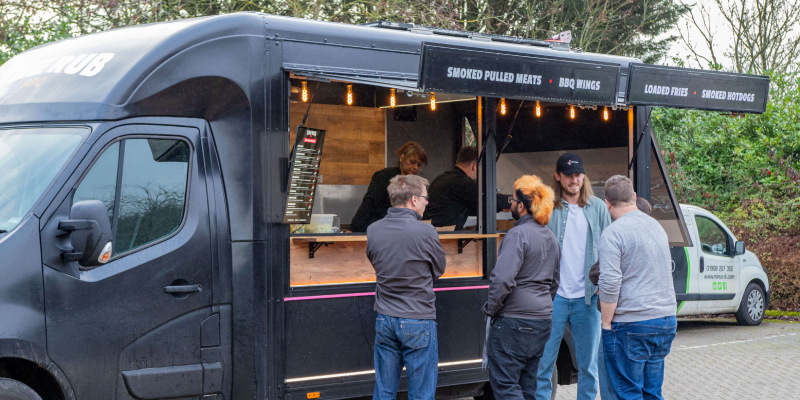 Customers outside van